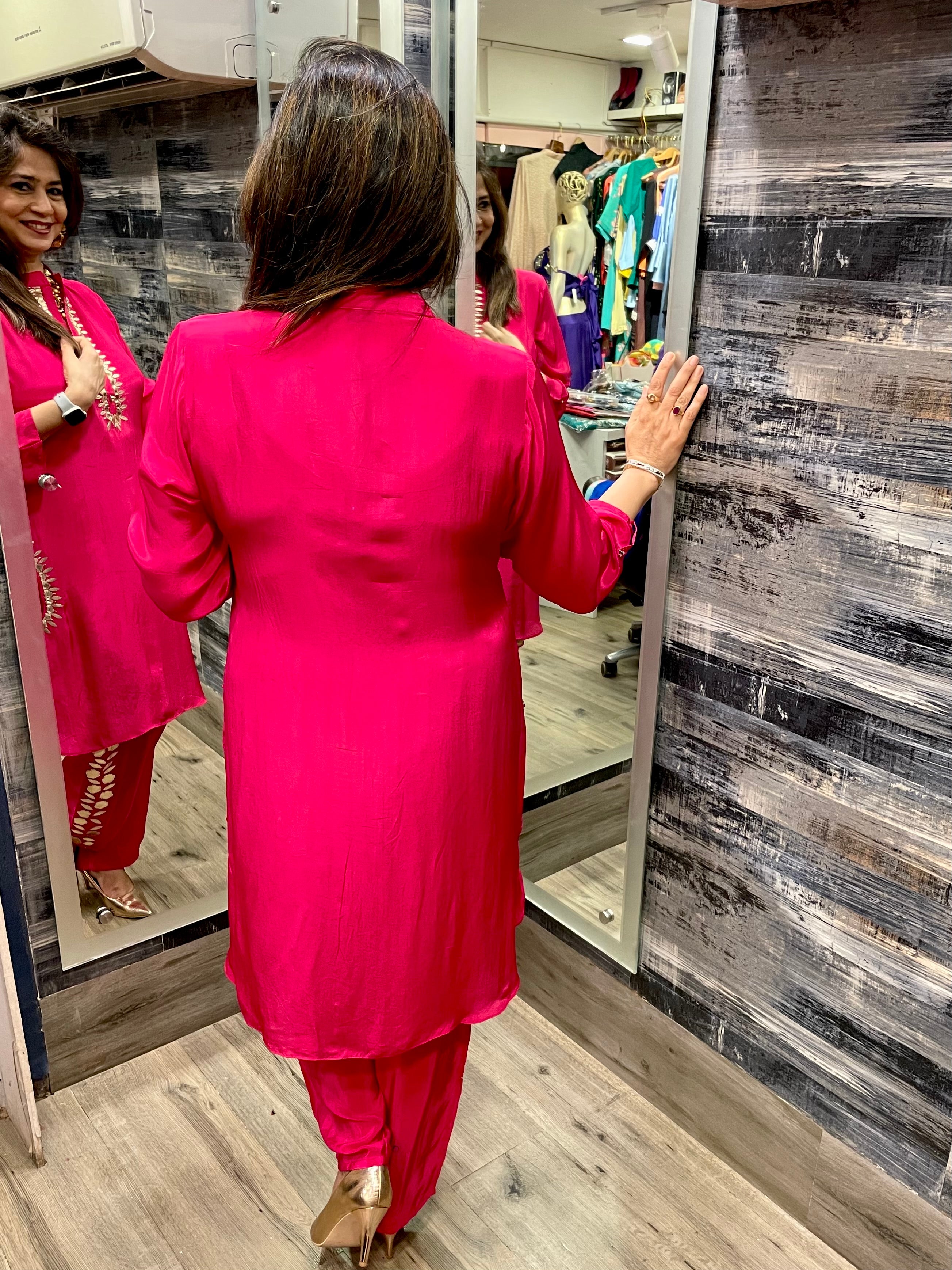 Chic Hot Pink Outfit with Leather Detailing