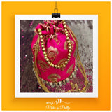 Pink Potli With Golden Sequin Work.